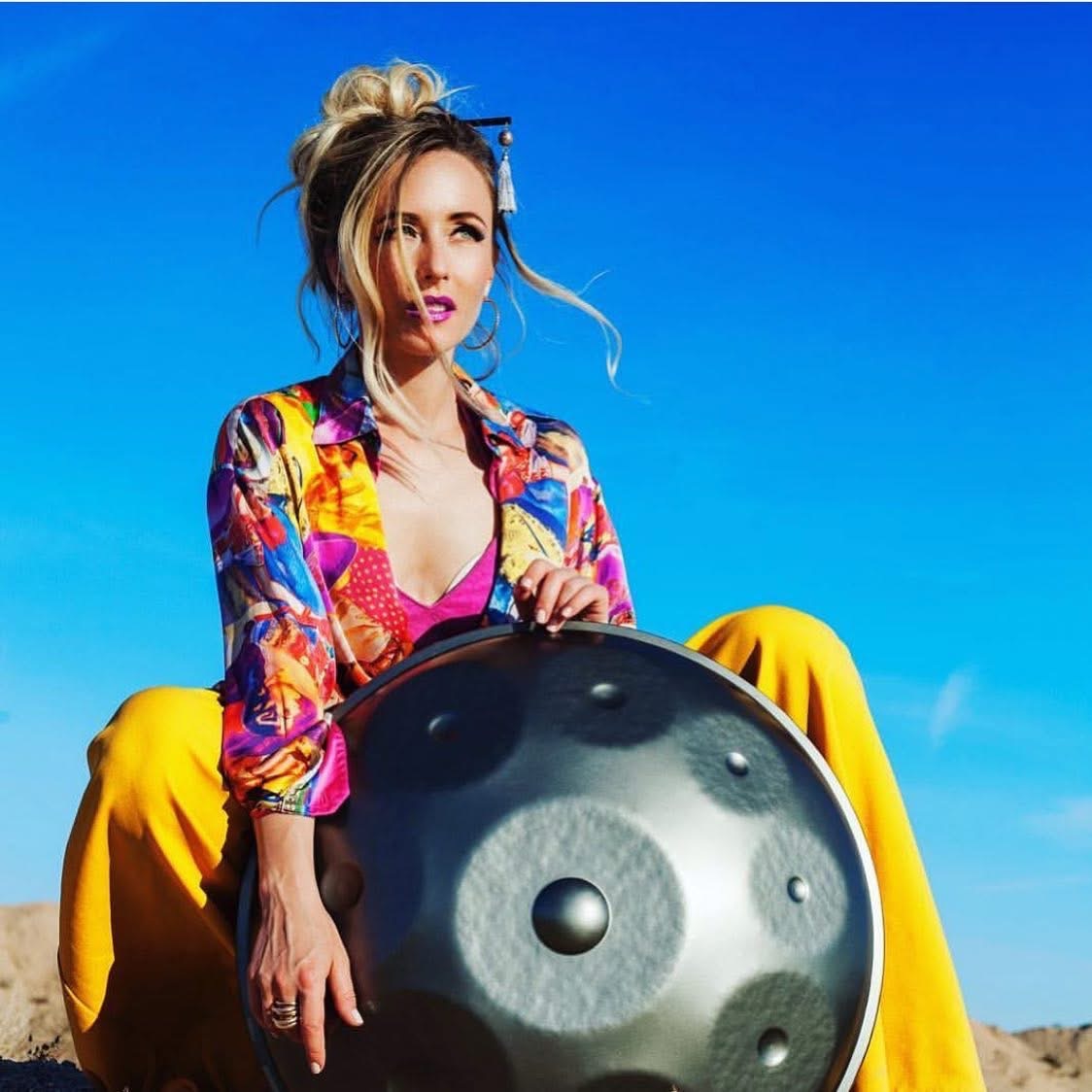 Sound healing practitioner with handpan